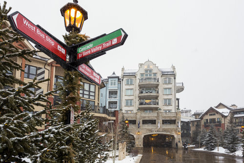 Snowy Vail village street beside the Arrabelle residences