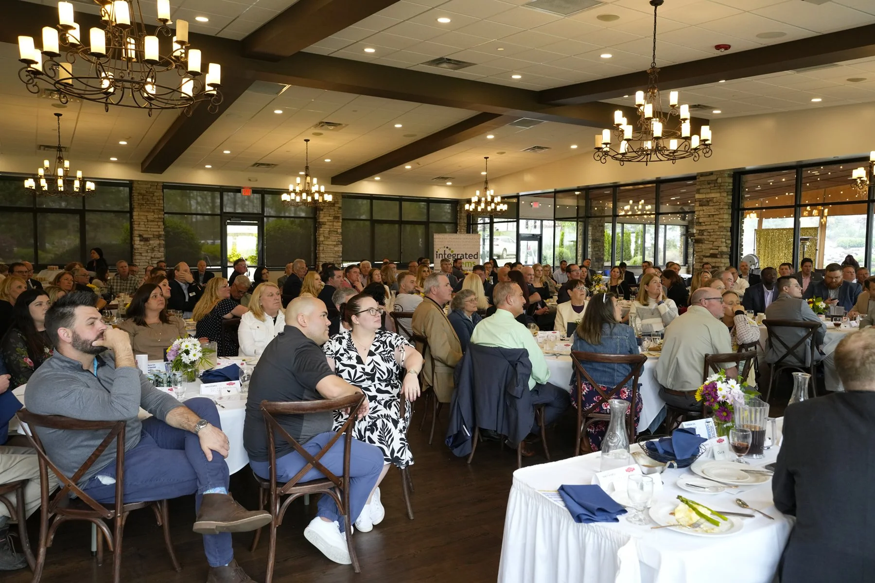 Attendees Watching Speaker 2.jpg