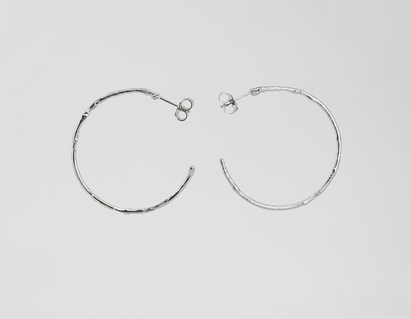 APRIL MARCH LARGE SILVER TEXTURED HOOPS.jpeg