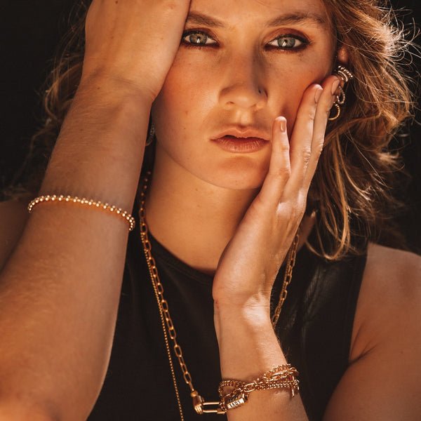 SCREAM PRETTY GOLD BALL BRACELET 1.jpeg