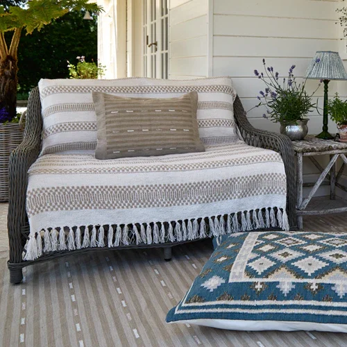 NomadStellaFloorCushion_CosmoManzaillaRugandCushion_KalamiNaturalblanket.webp