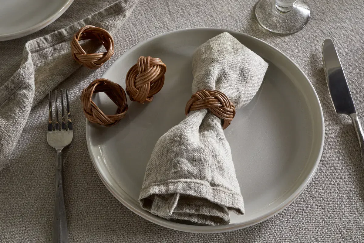 NKUKU BERSAMA RATTAN NAPKIN RINGS - NATURAL - SET OF 4