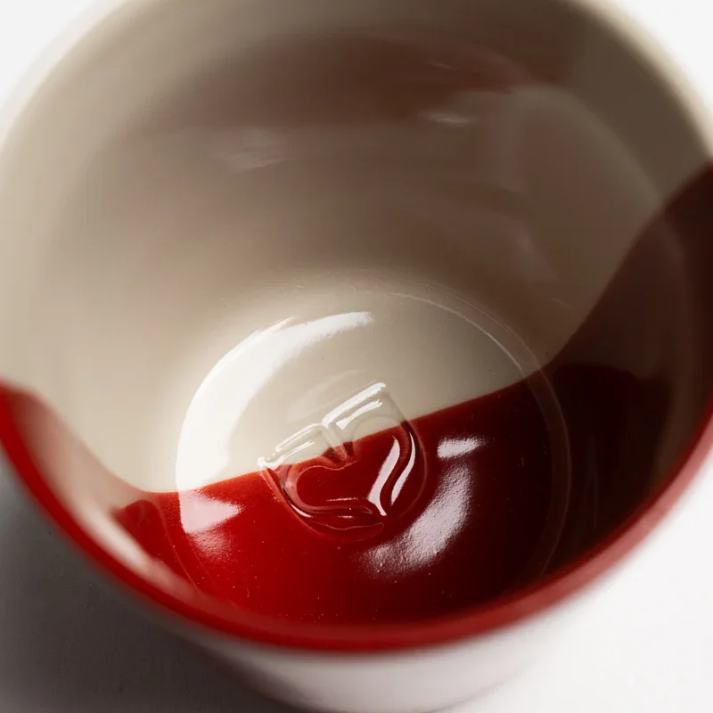 Closeup-rue-earth-red.webp