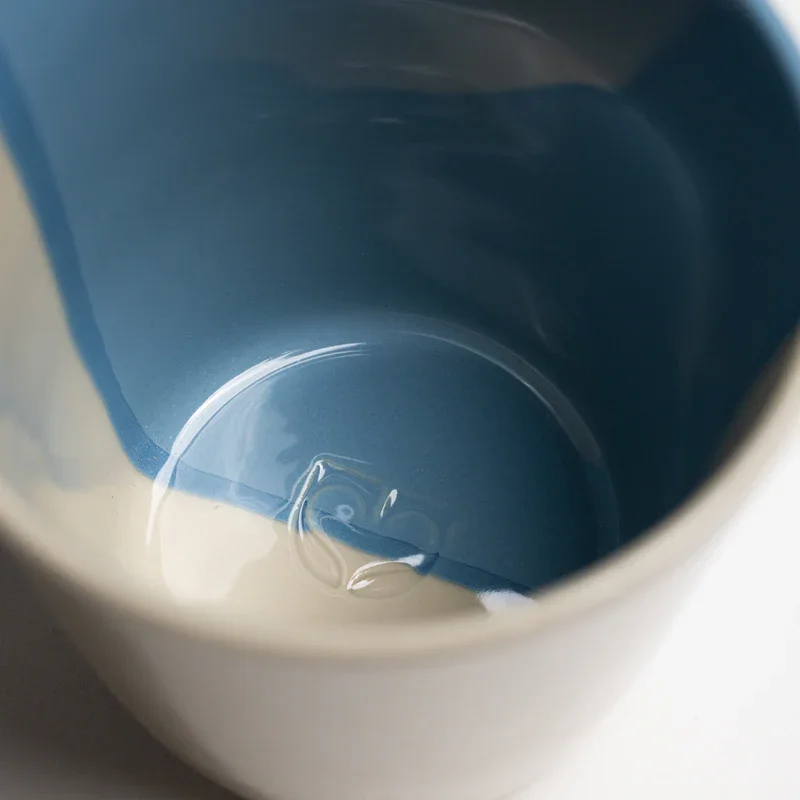 Closeup-rue-blue-beaker.webp