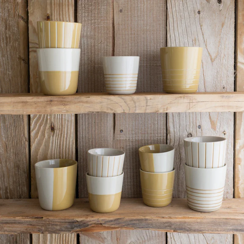 Mixed-collection-mustard-yellow-beakers.webp