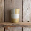 mustard_yellow_rue_large_beaker_stacked.webp