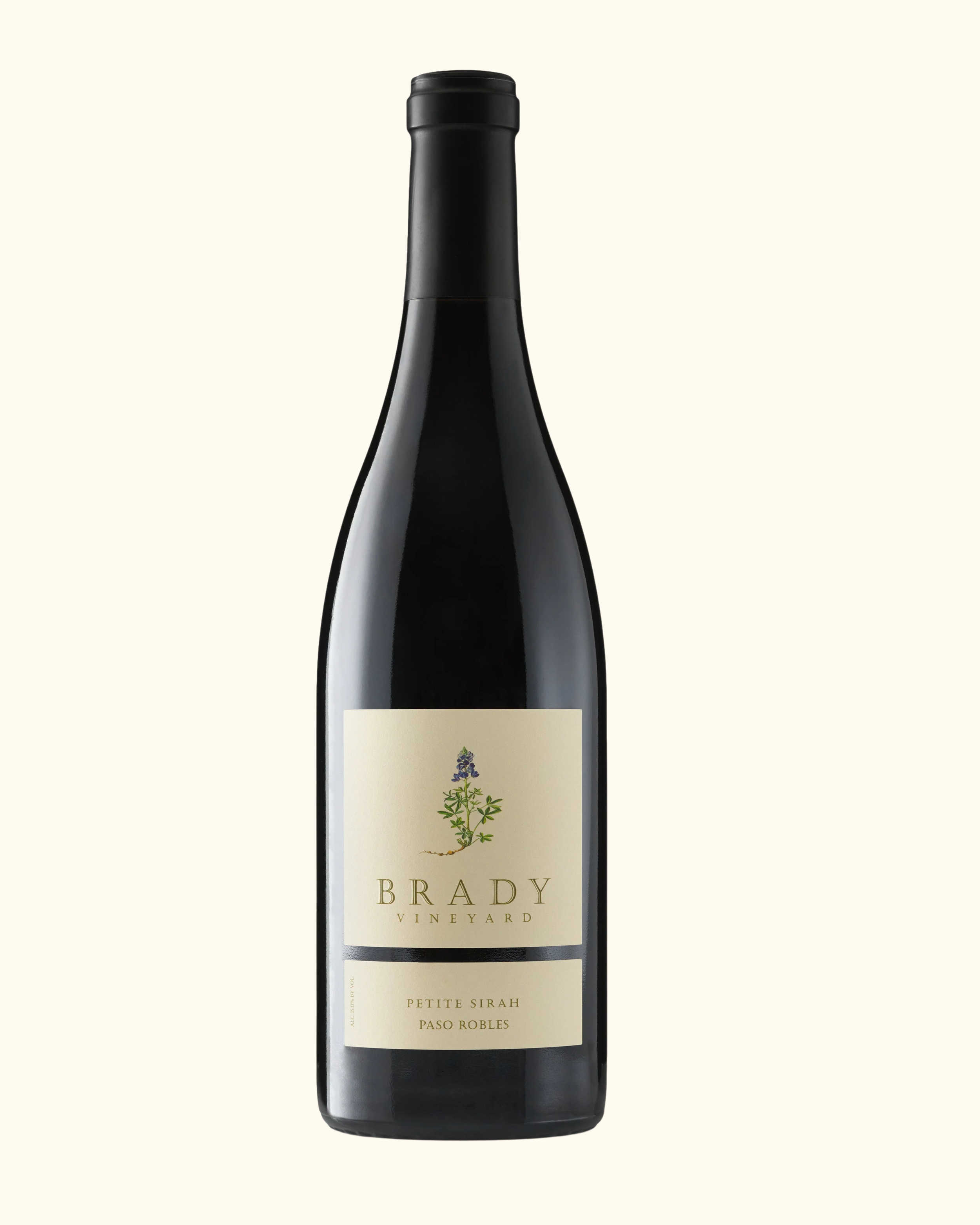 Bottle of Brady Vineyard Petite Sirah wine from Paso Robles with a cream-colored label featuring a small plant illustration.