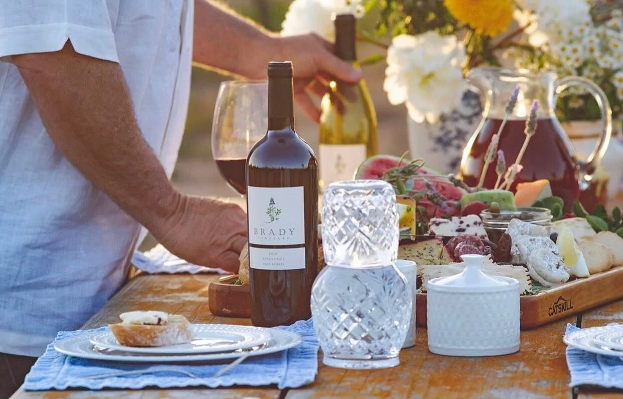 The Brady family vineyard grows in the scenic lupine-dappled, Estrella River Valley of Paso Robles. Veteran winemaker Don Brady finds the area reminiscent of his native Texas blue bonnet country. This Zinfandel is crafted exclusively from low-yield h
