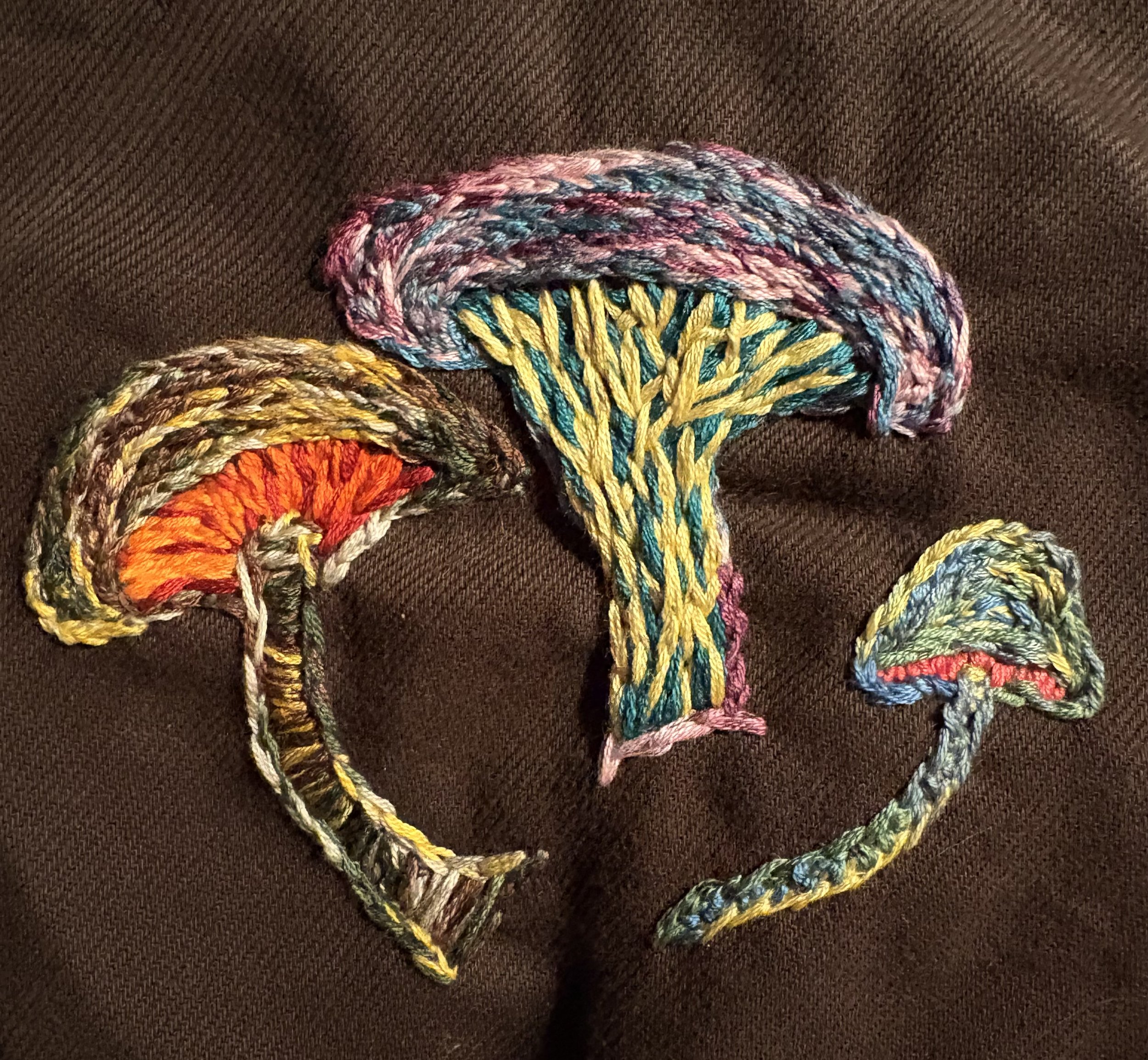 custom hand-stitched embroidery on denim