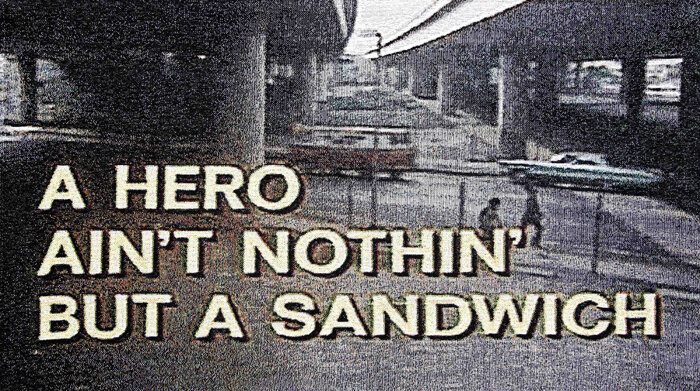  A Hero Ain’t Nothin’ But a Sandwich, Cotton tapestry, 15 x 26 inches, 2013, Framed 