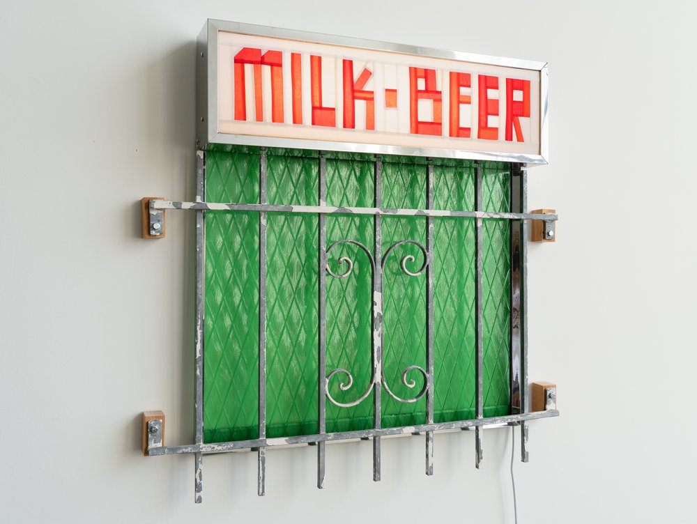   Jeffrey Sincich   Milk • Beer  Steel frame, quilted cotton, LED light, vintage glass, window grate 37 x 37 x 5 inches 2023 