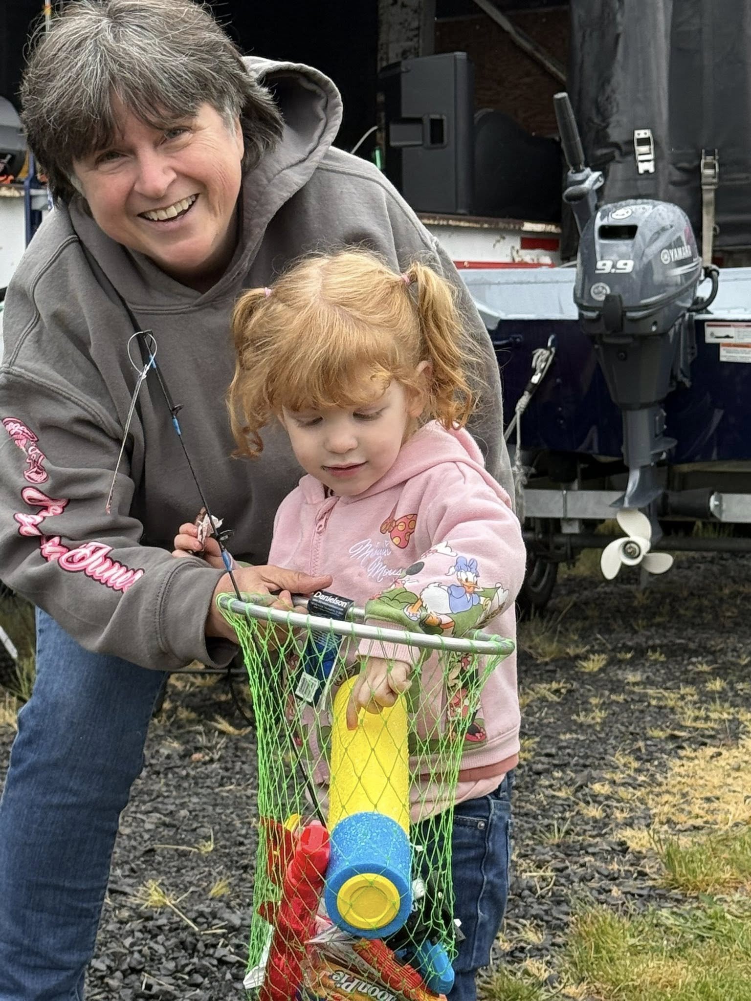 little girl winning a net prize