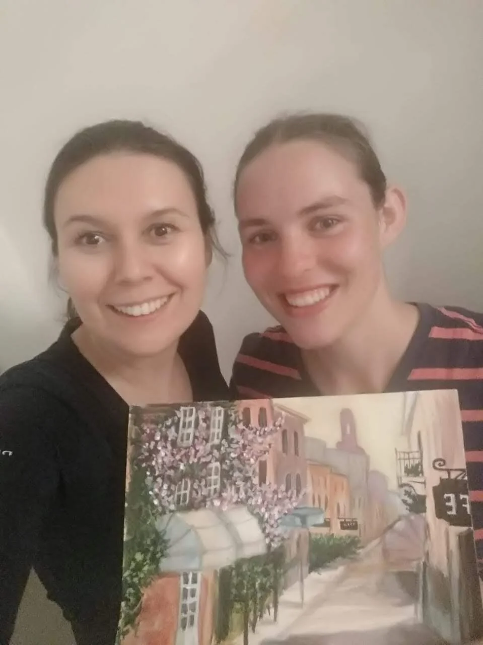 My host mom (on the left) liked to paint. When she finished this one, she gave it to me as a going away present!