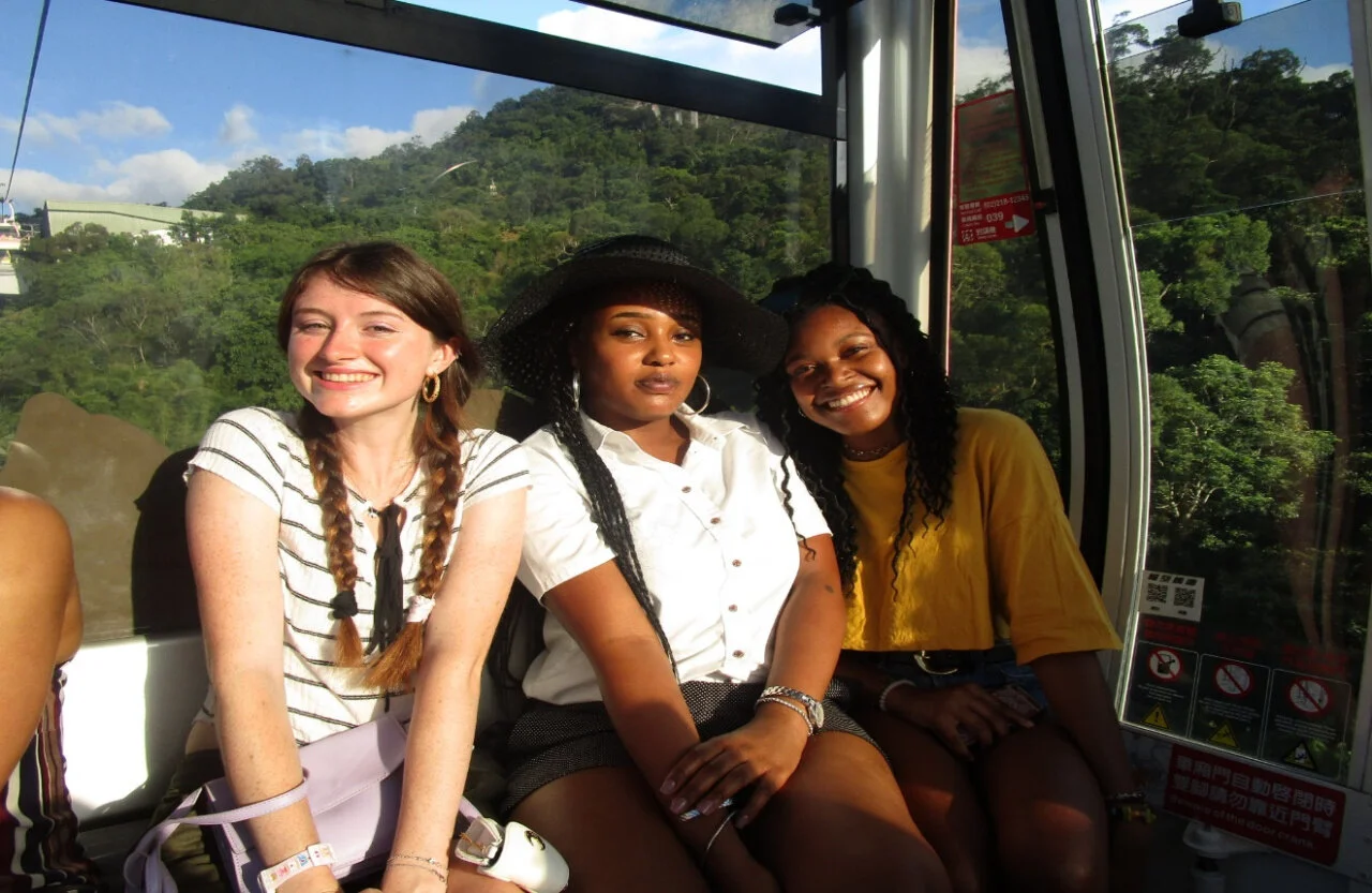 Figure 1 (from L to R) Chandler, me, and Starr posing for a picture while riding on the gondola!
