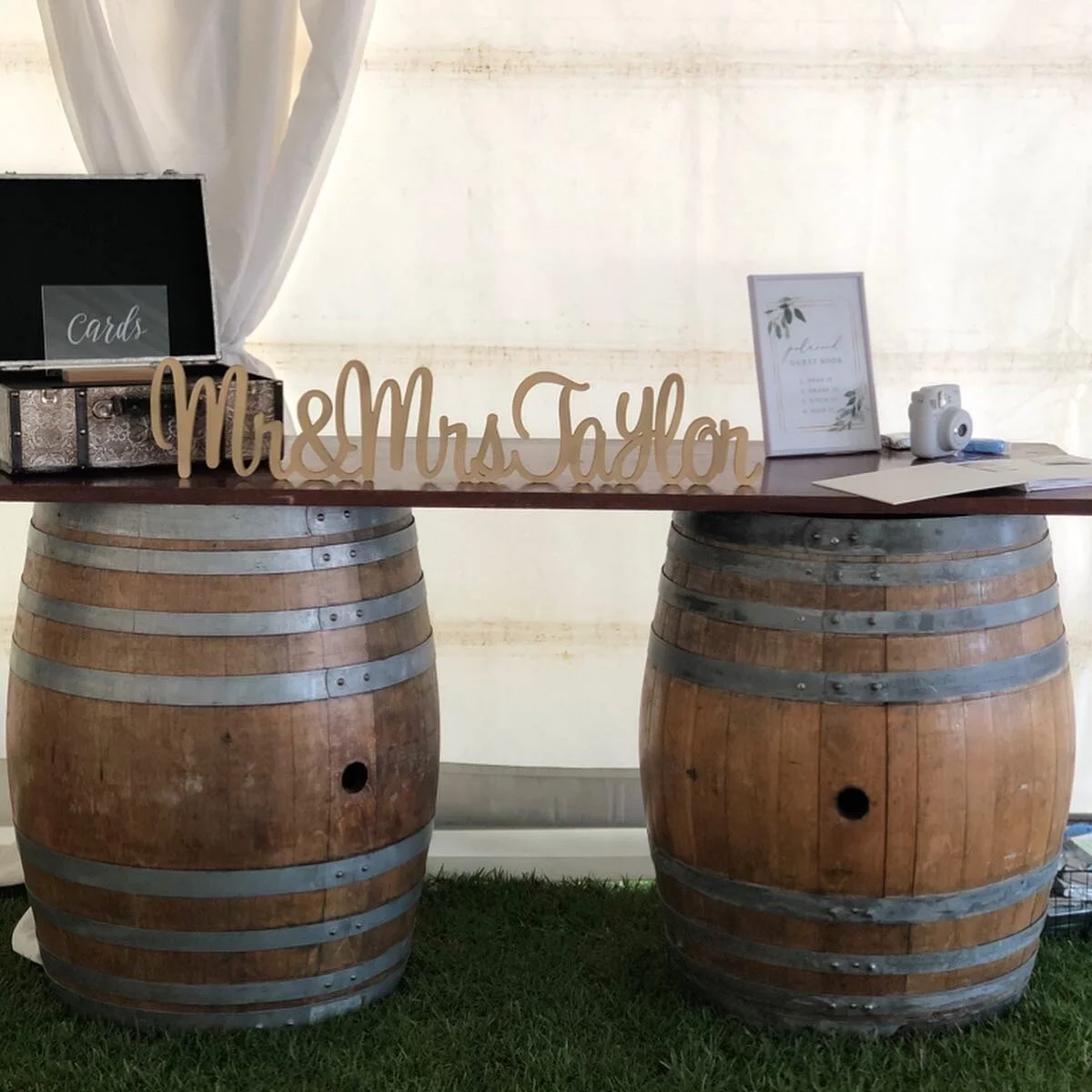 Wine barrels with Timber table top.jpeg