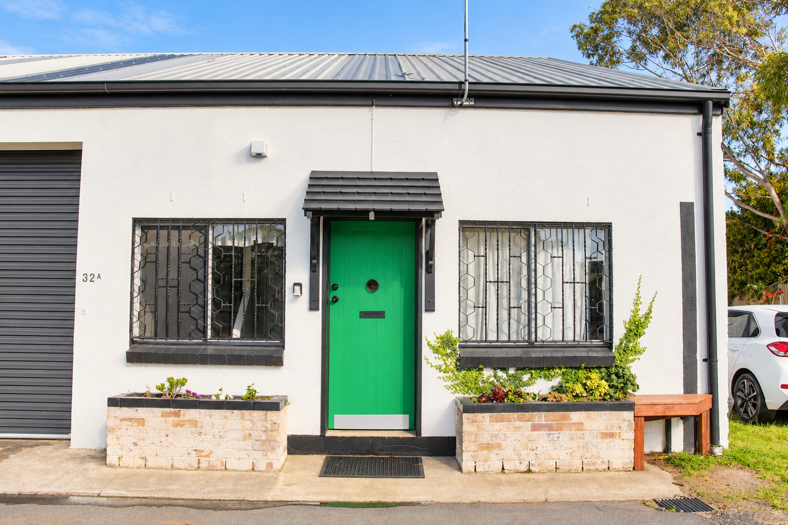 Welcoming Home With Green Door.png