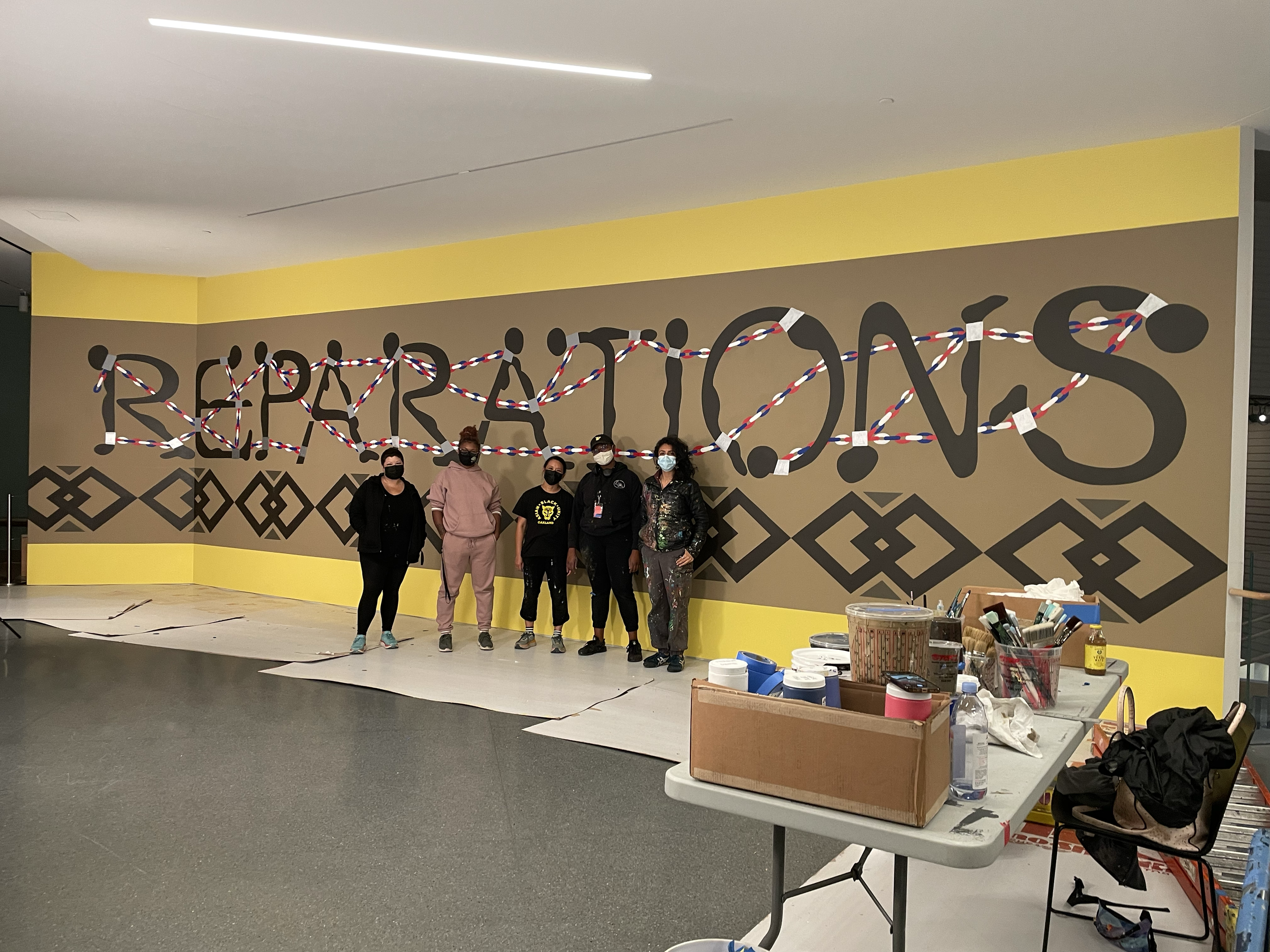 Reparations Mural by Emory Douglass at SFMoma 2020 with Twin Mural Company, Lauryn & Abayomi Brownfield