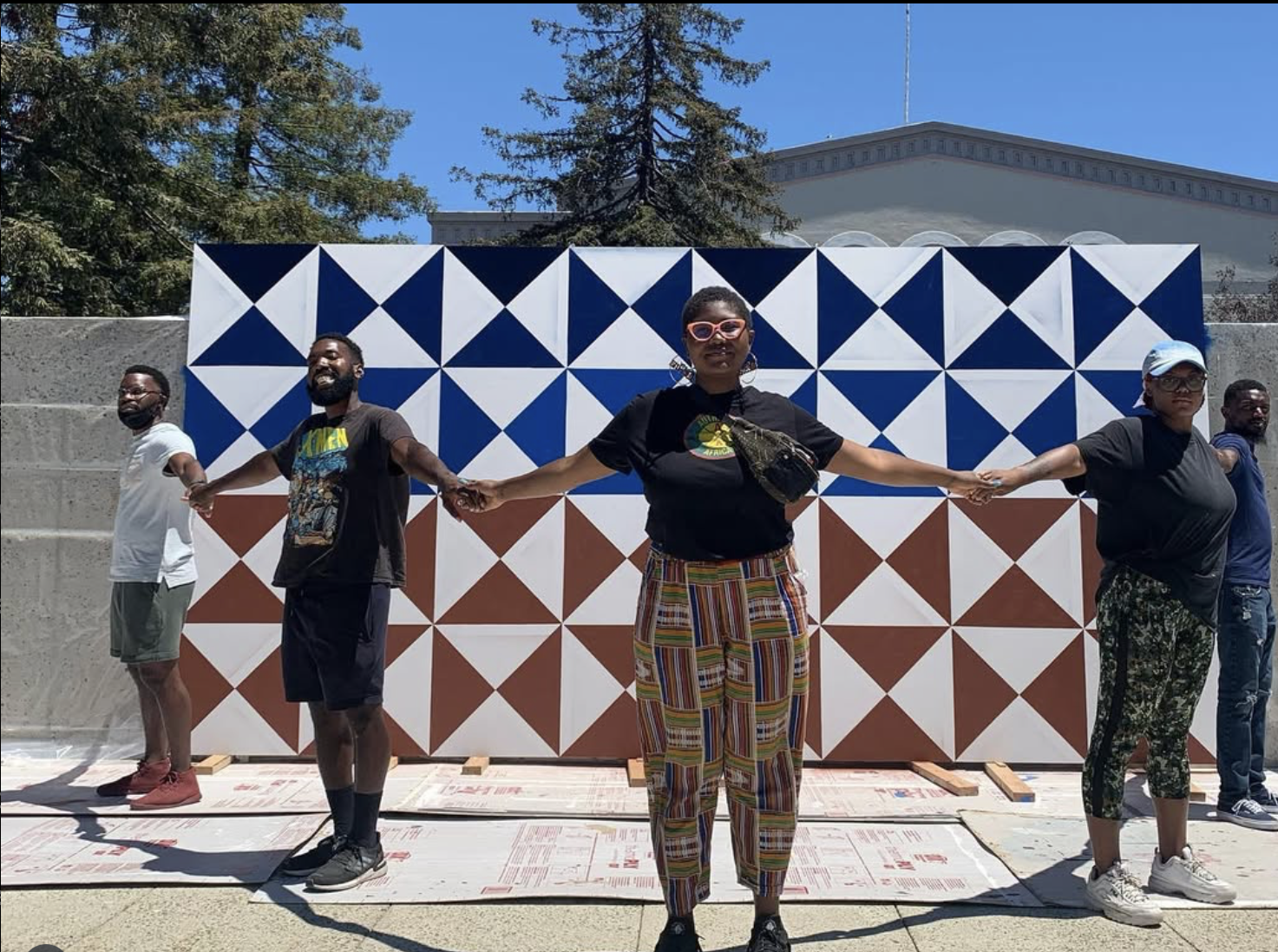 Juneteenth Mural at Oakland Museum of California Arts. Led & designed by Yomi with the support of Aerosoul Collective and Lauryn.