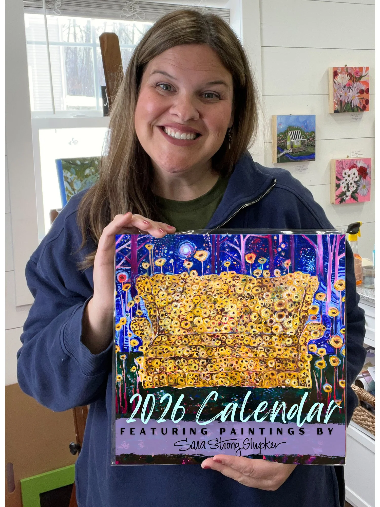 holding 2026 calendar.jpg