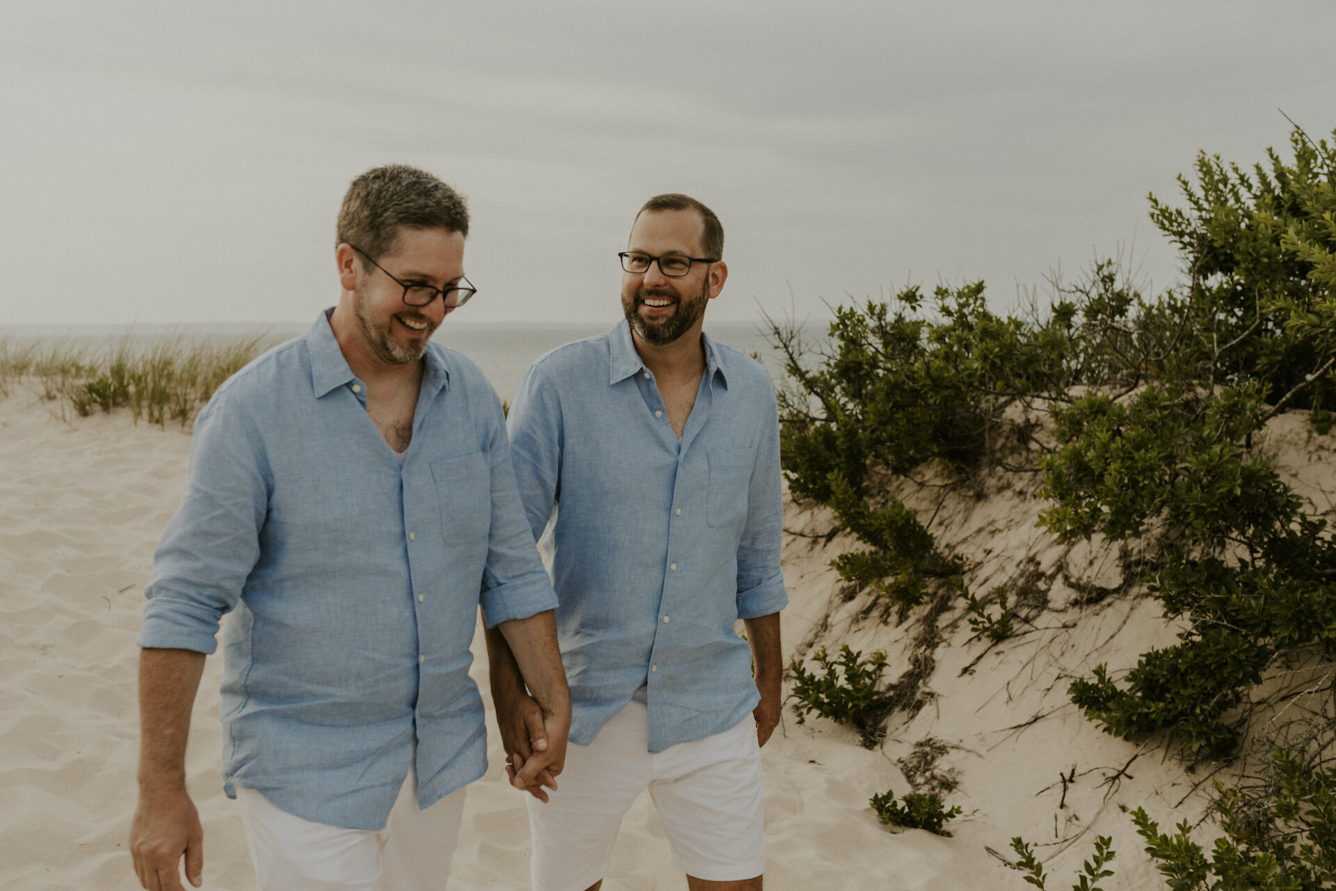 Couple walking on Marthas Vineyard beach.jpg