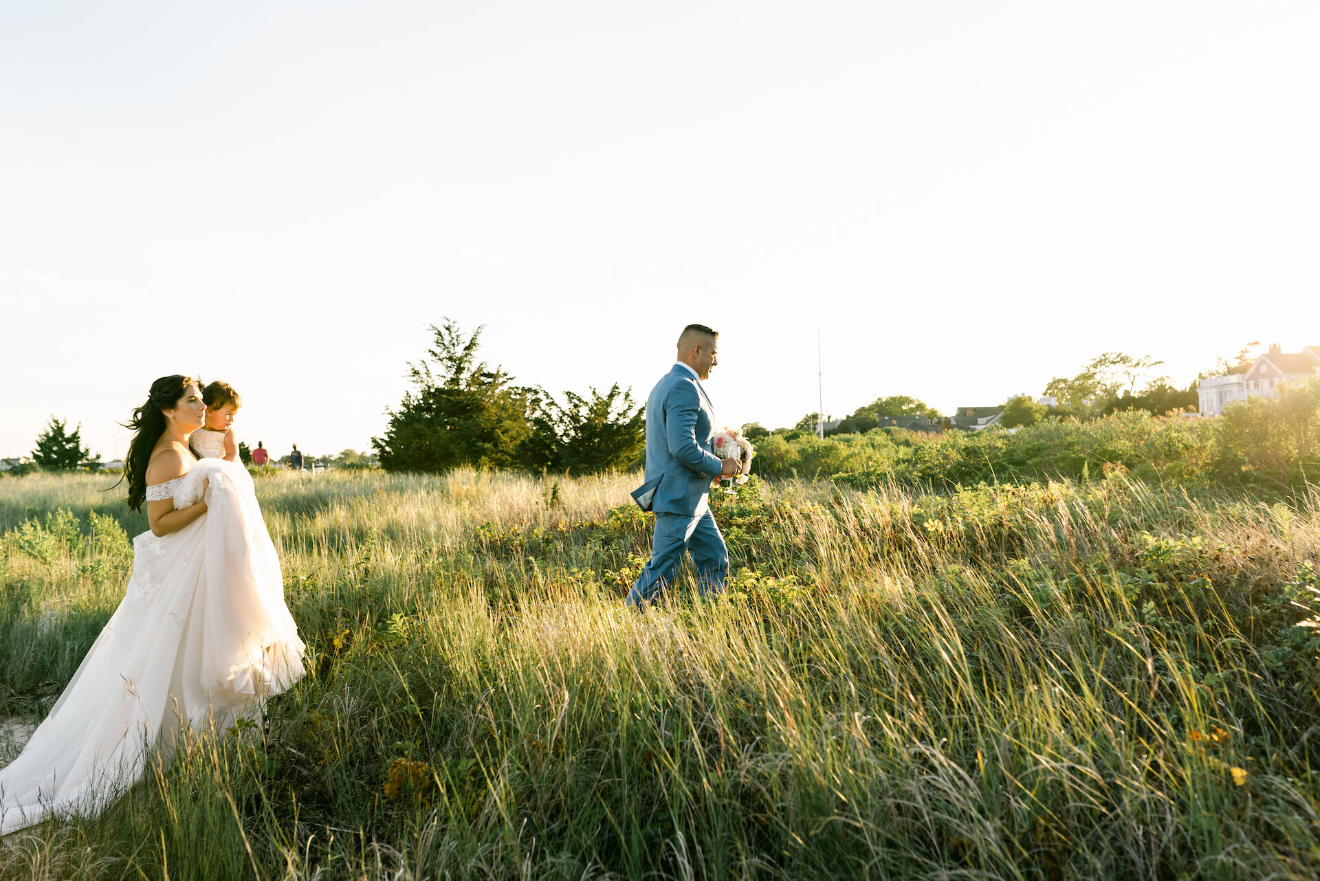 Couple walking through dunes on Marthas Vineyard.jpg