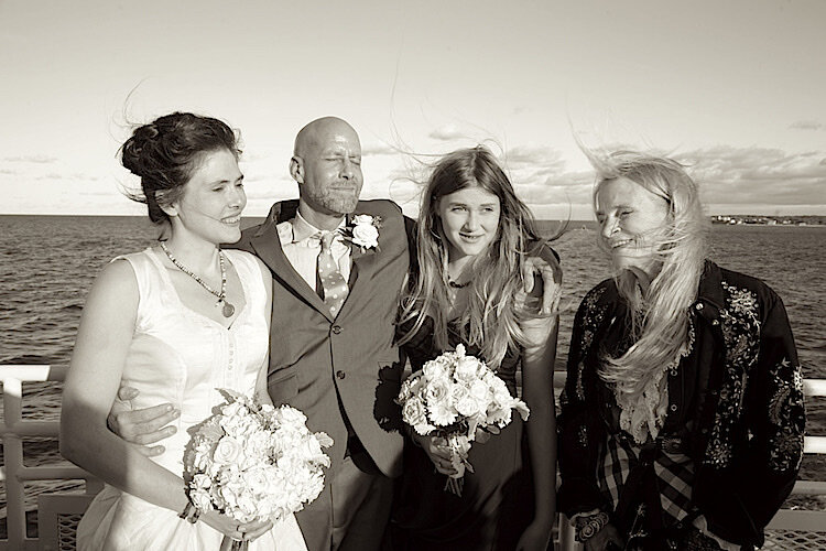 Friends after an elopement on a ferry