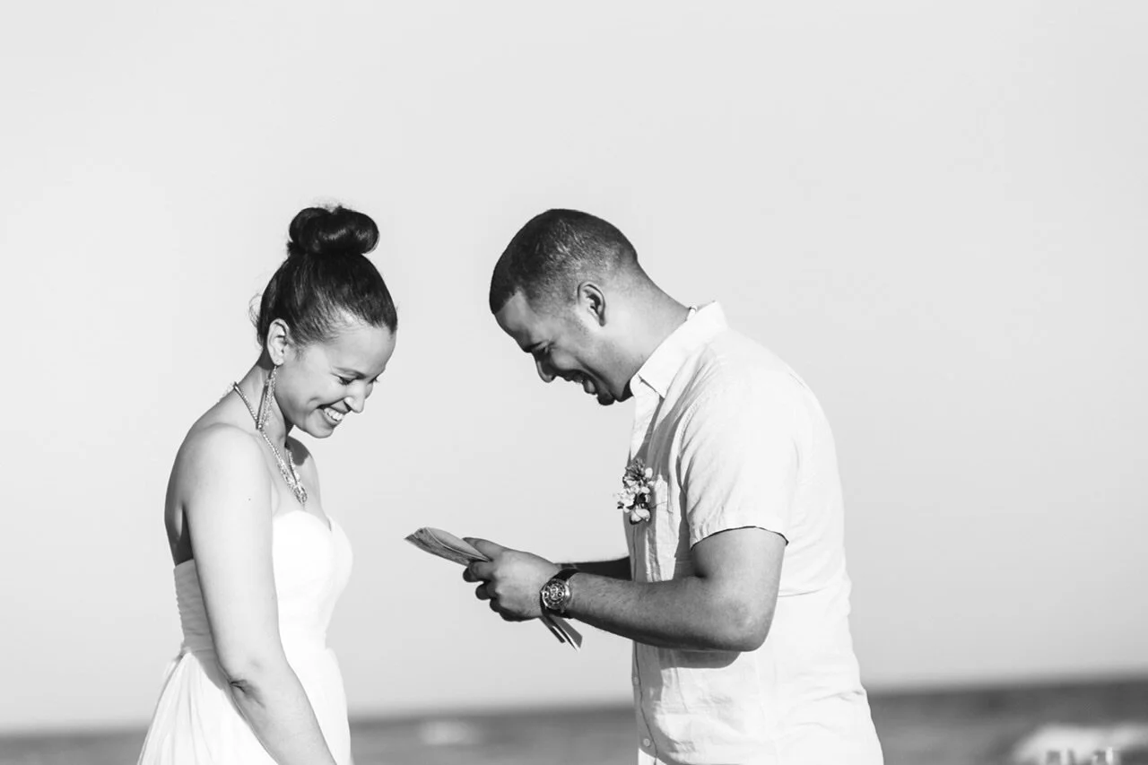 Couple saying their vows to one another.