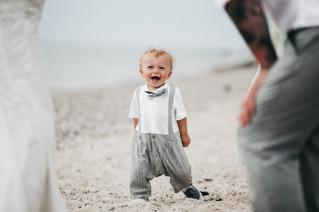 Baby on Marthas Vineyard beach after wedding.jpg