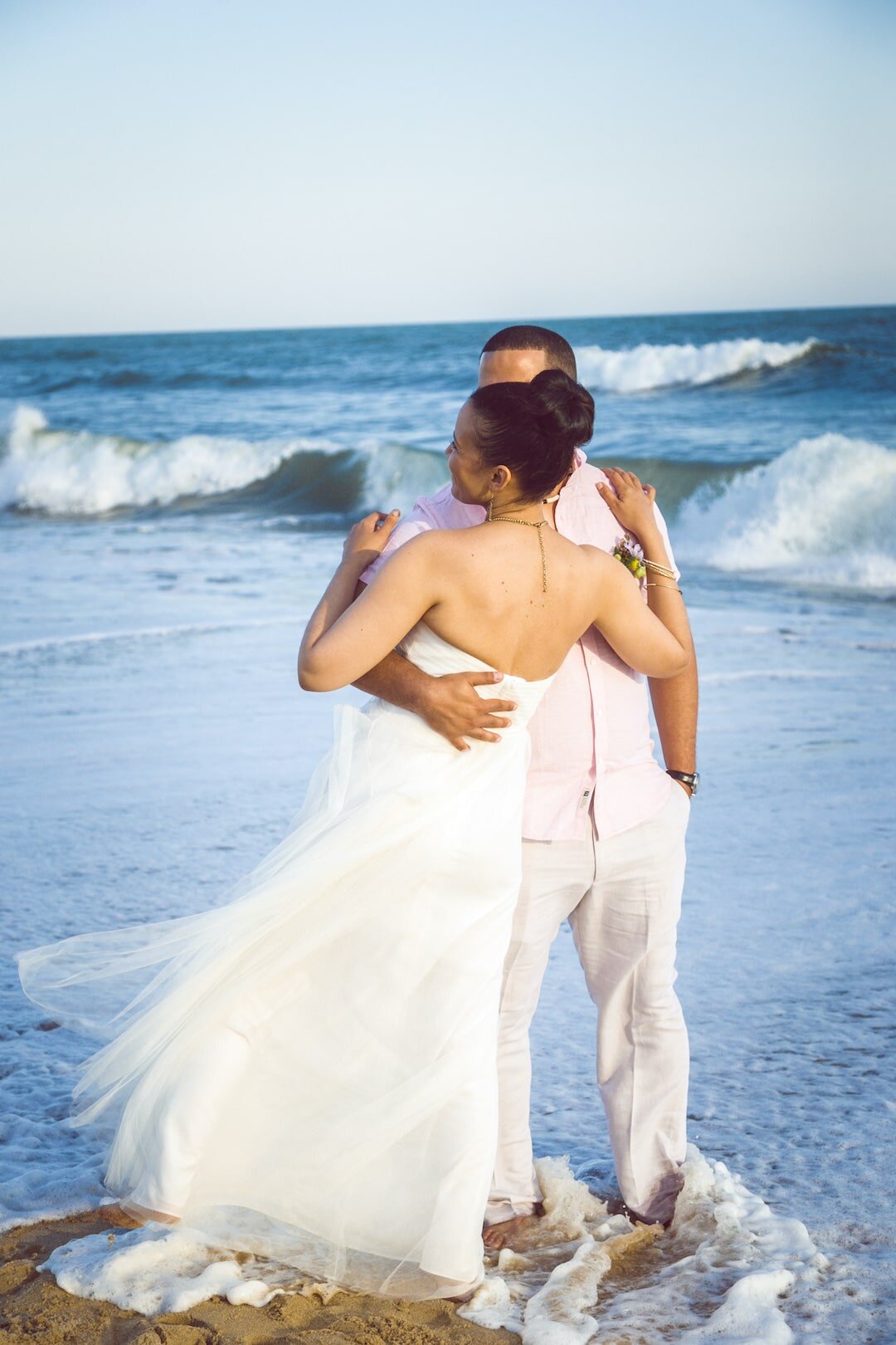 Couple dancing in the ocean after wedding on Marthas Vineyard.jpg