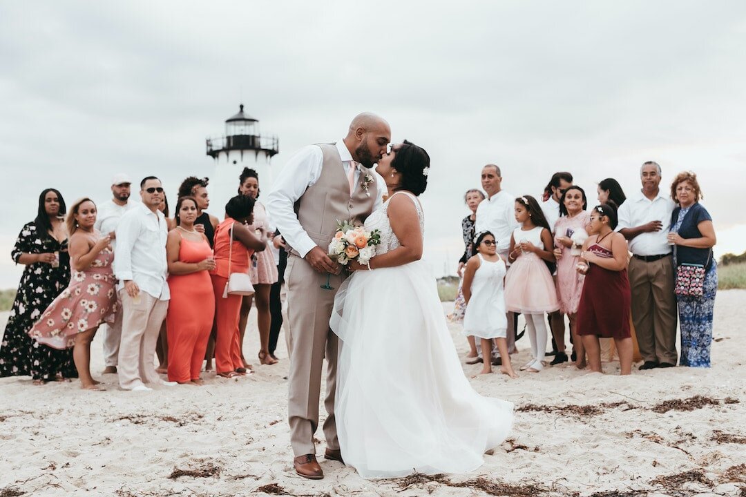 Couple during marthas vineyard elopement ceremony at Edgartown lighthouse.jpg