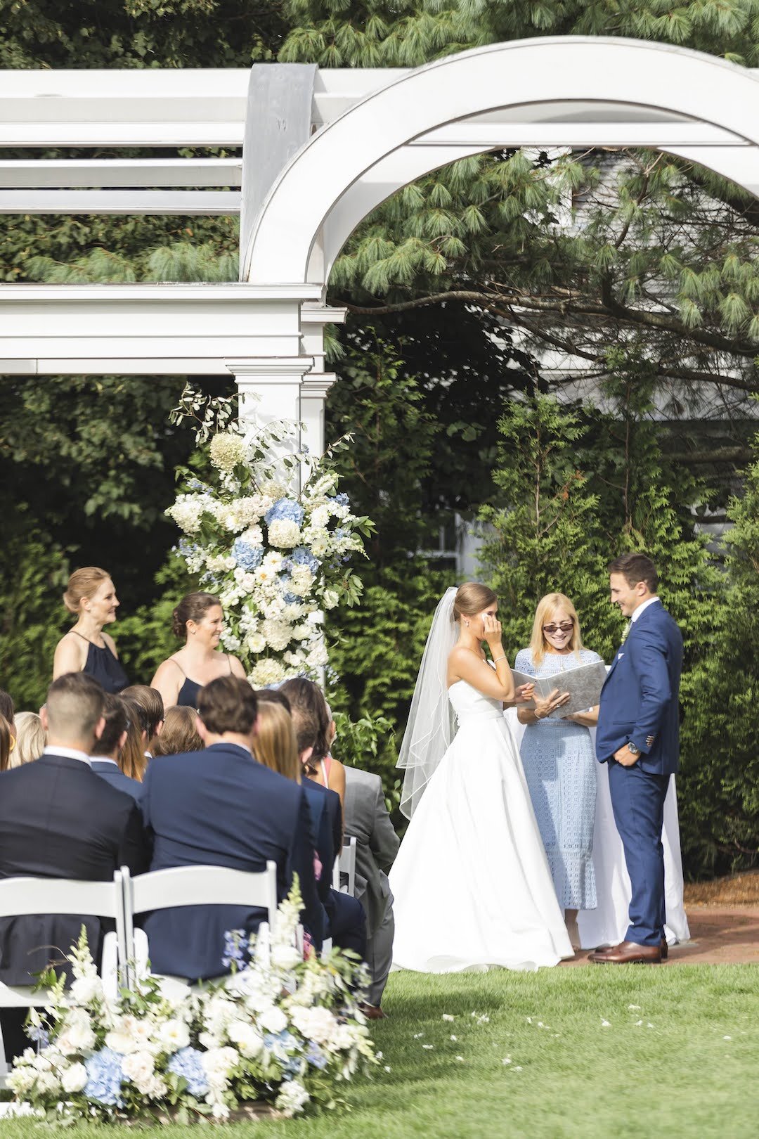 Couple exchanging vows during wedding on Marthas Vineyard.jpg