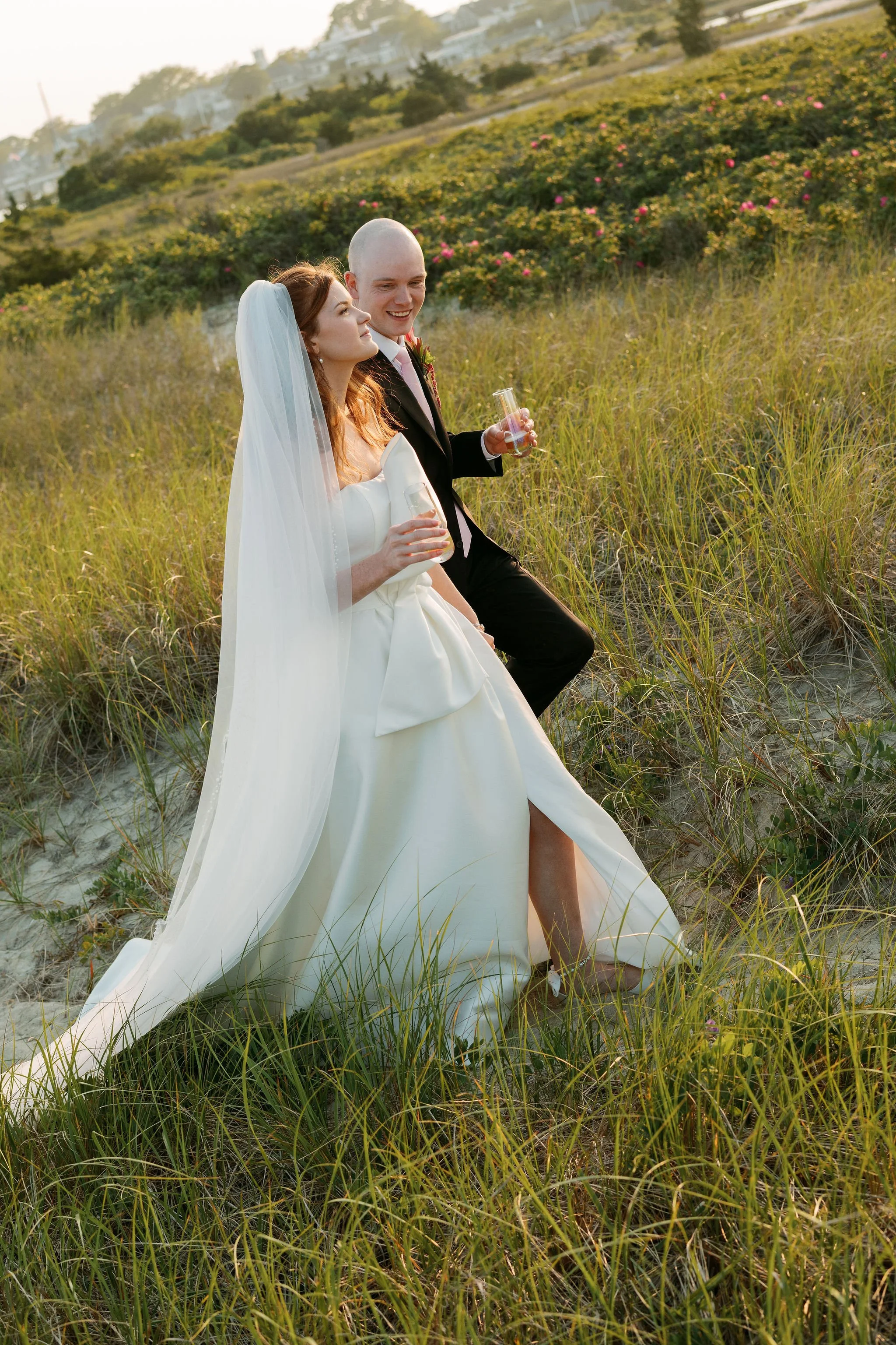 10.Just Married Couple Walking Through Beach Dunes.jpg
