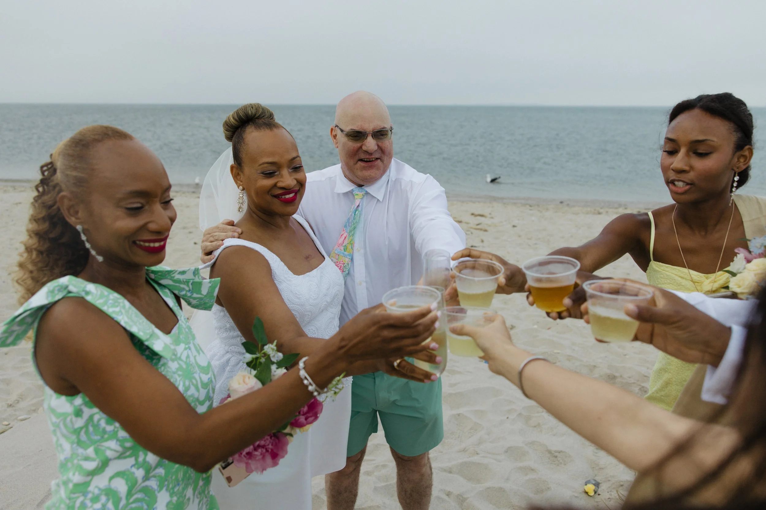 Bride & Groom toasting their family