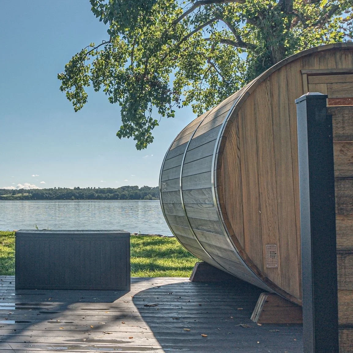Wood-Barrel Saunas on the Riverfront