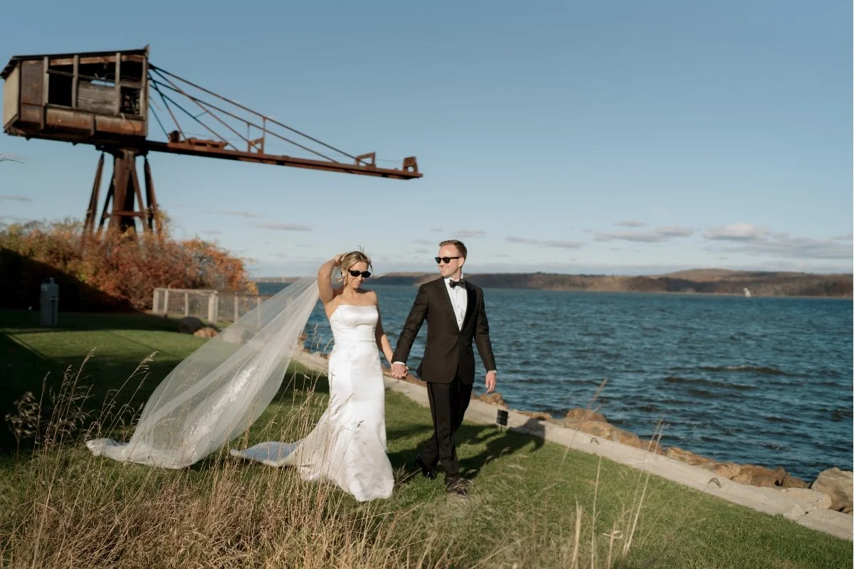 The Autumn Wedding By the River During Peak Fall Foliage
