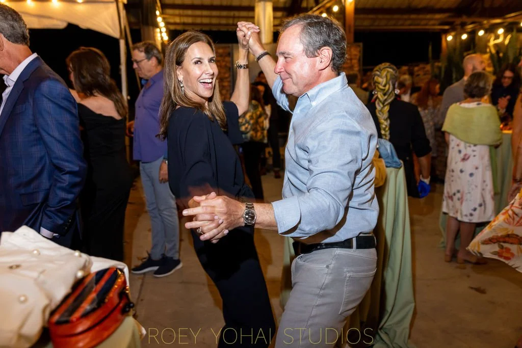  Family and friends dance at the wedding reception 
