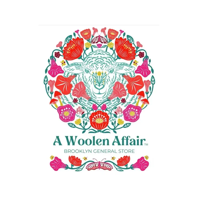 Colorful floral and animal illustration with a goat's face at the center, surrounded by flowers, leaves, and a butterfly, with text reading "A Woolen Affair Brooklyn General Store."