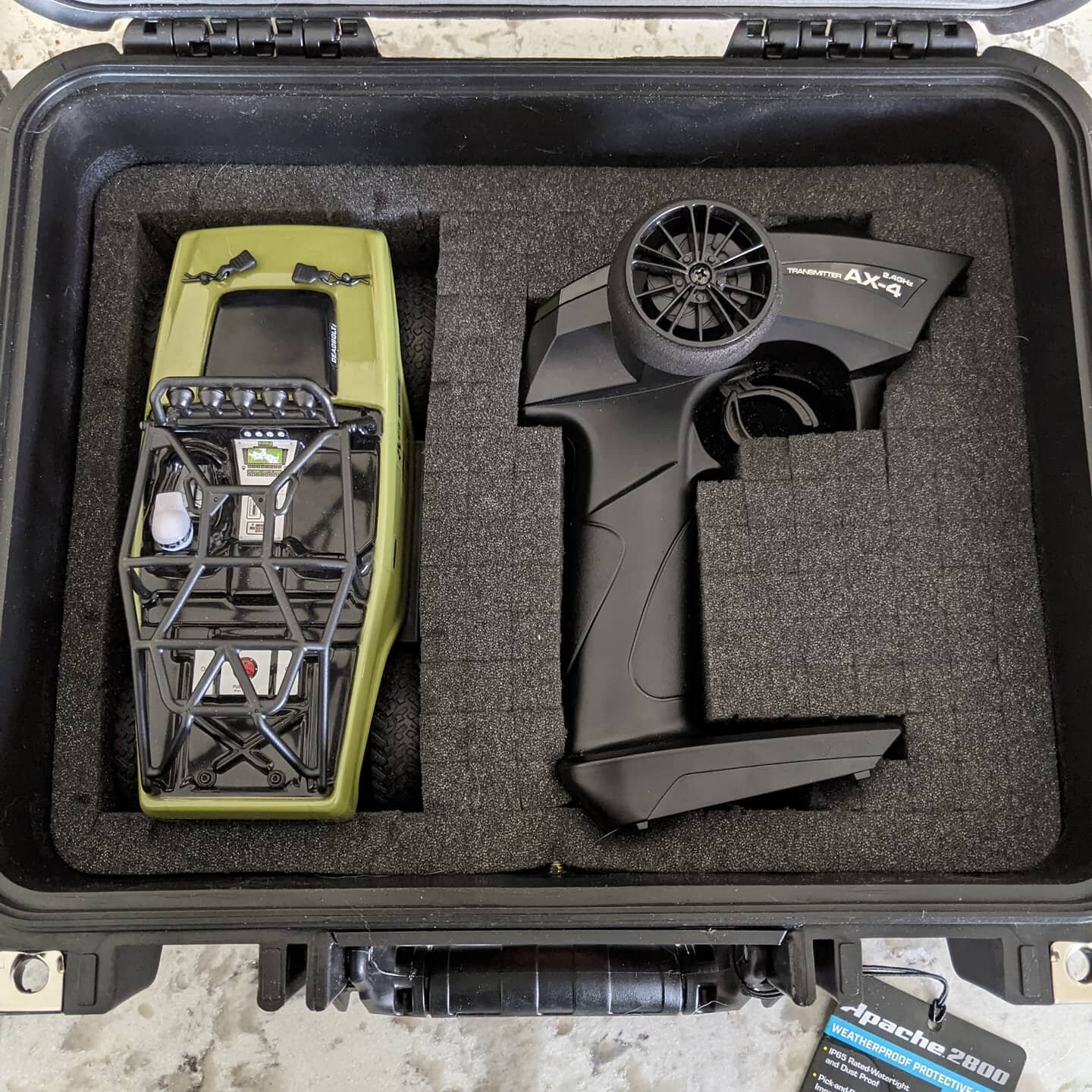 If you're looking for a carrying case, the Apache 2800 from @harborfreight  is a great size for one vehicle with receiver and any extra parts you might want to carry. We had to cut out tire slots in the bottom layer but the right fit is worth it. 
.
