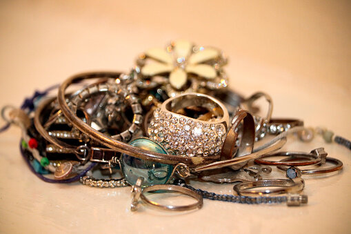  A photo of a pile of female jewellery. 