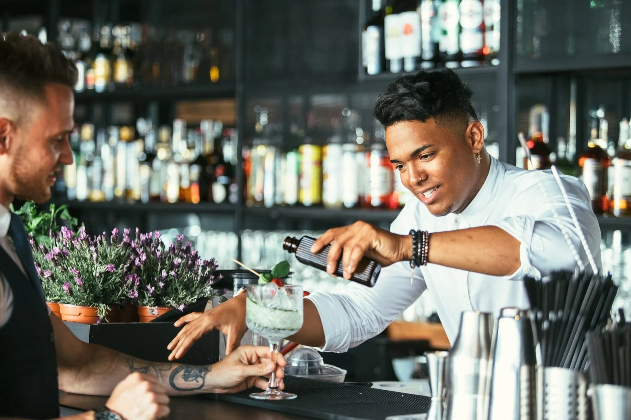 Hospitality-Bartender-Man-making-cocktail-Indeed-Flex-2100x1400.jpeg