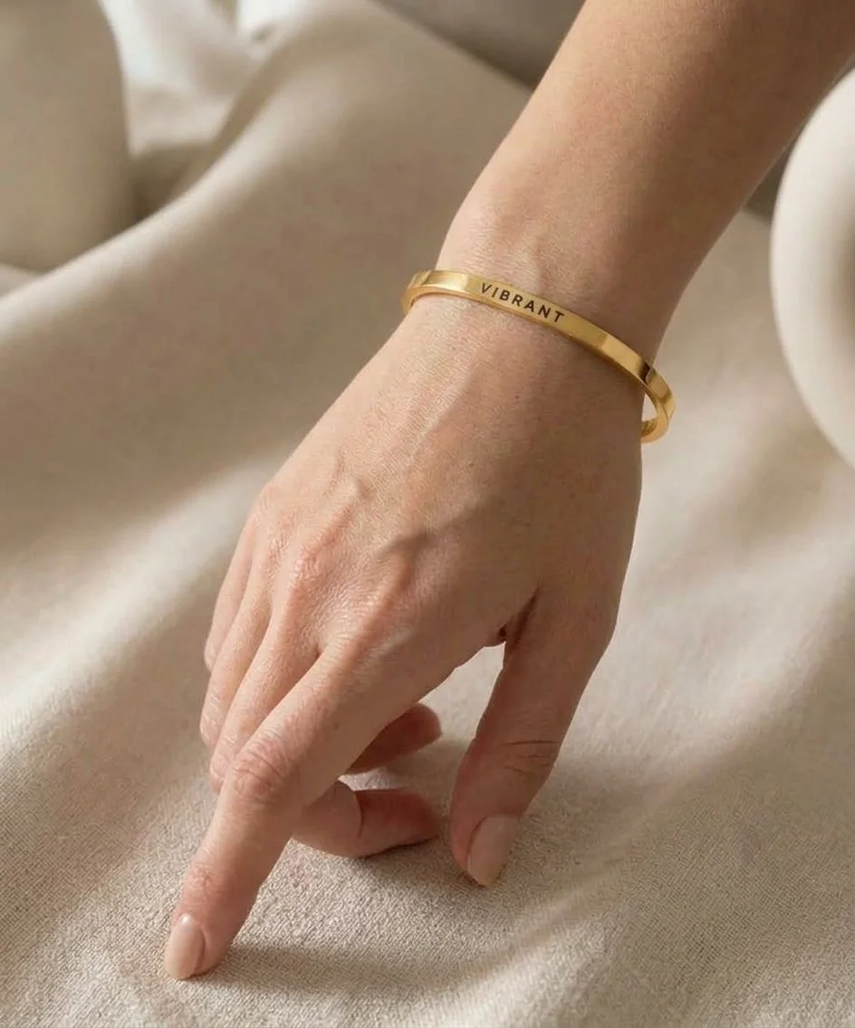 gold-cuff-protection-bracelet-on-hand.jpg