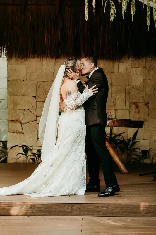 first-kiss-garden-ceremony.webp