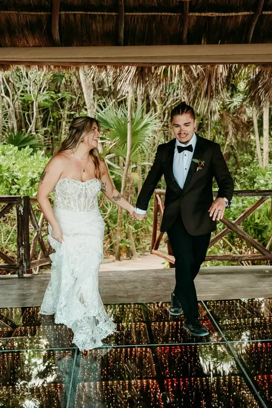 couple-entrance-wedding-reception.webp