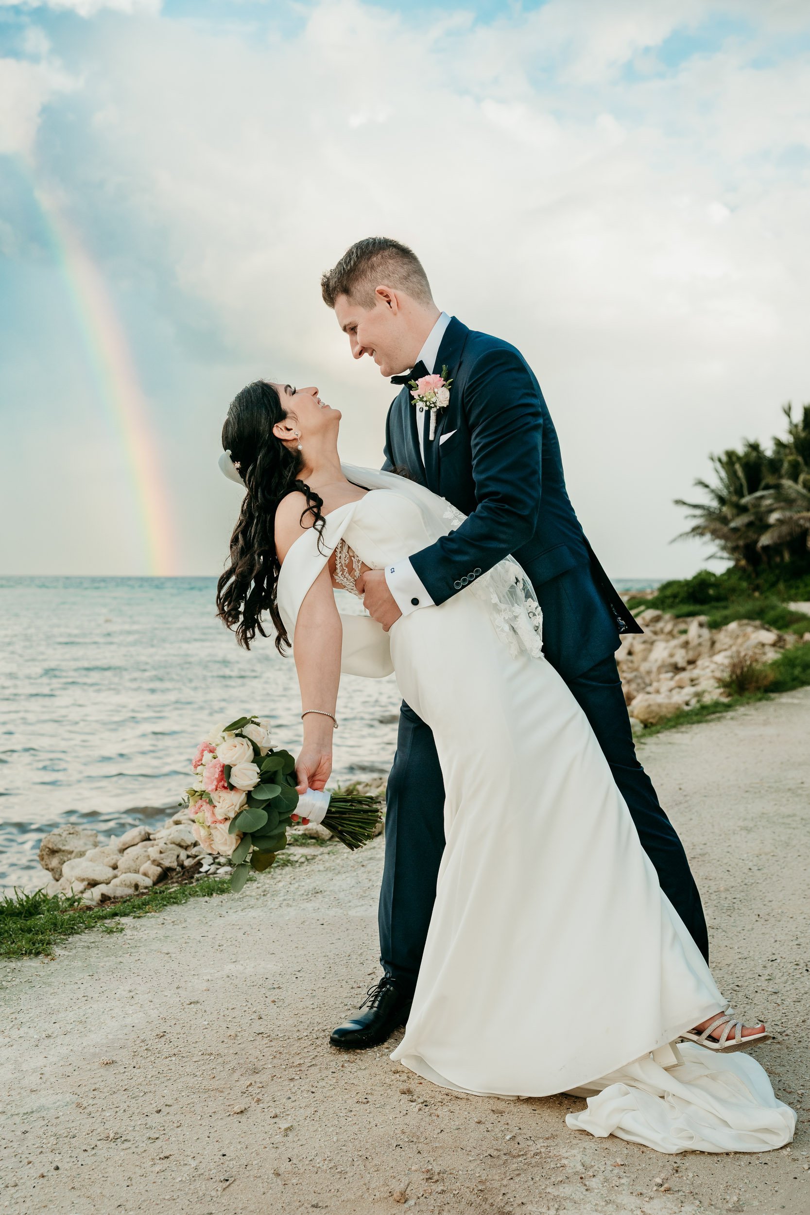 riviera-maya-wedding-photographer--couple-portrait-rainbow-backdrop.jpg