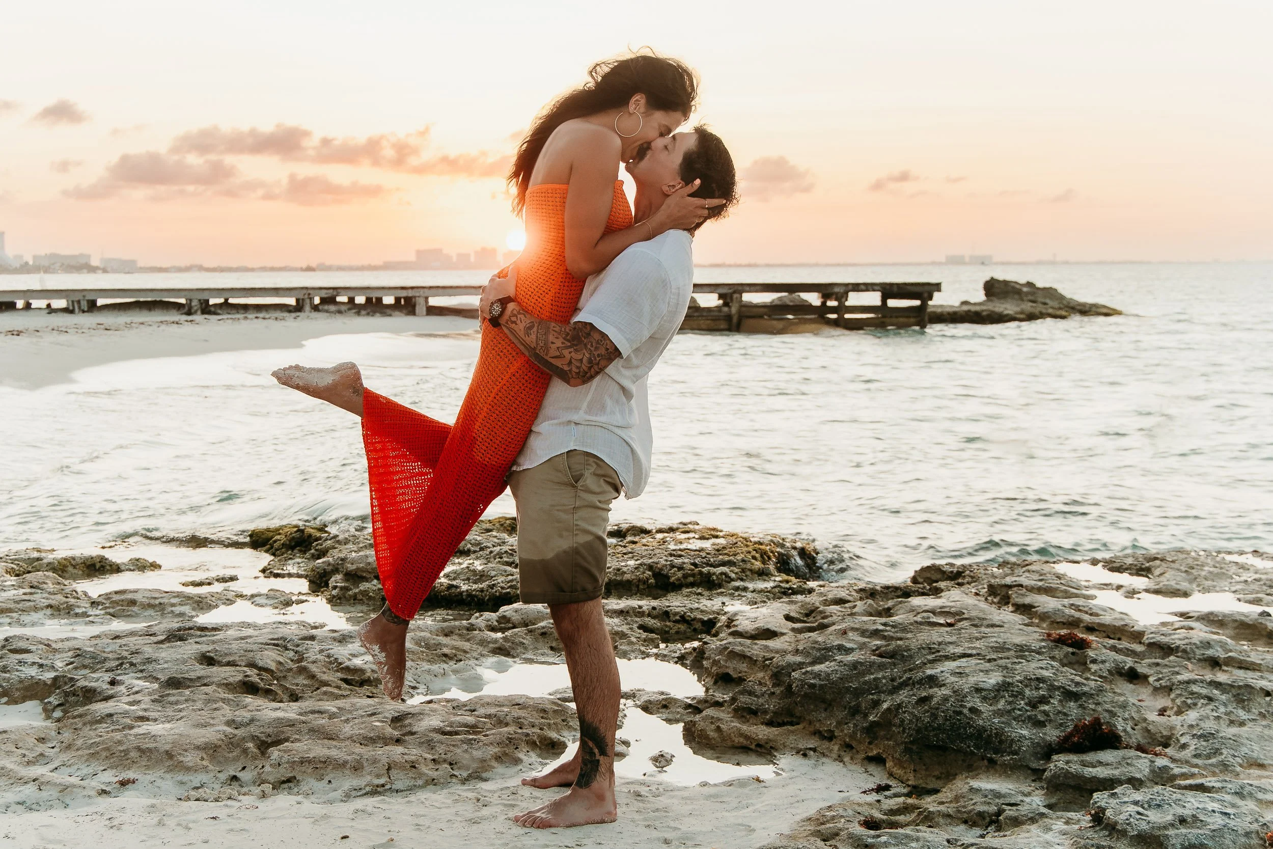 cancun-engagement-photographer-kiss-at-sunset.jpg