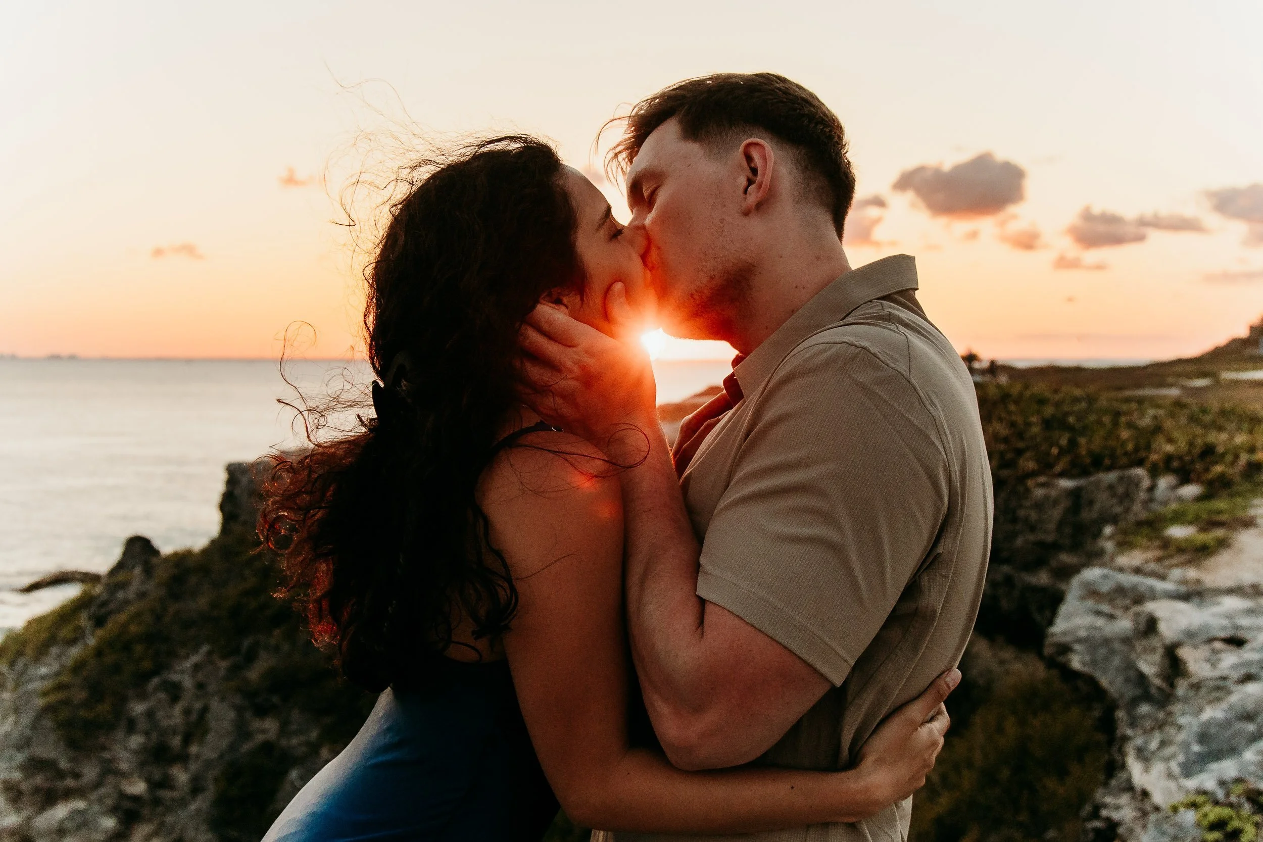 isla-mujeres-engagement-photographer-kiss-at-sunset.jpg