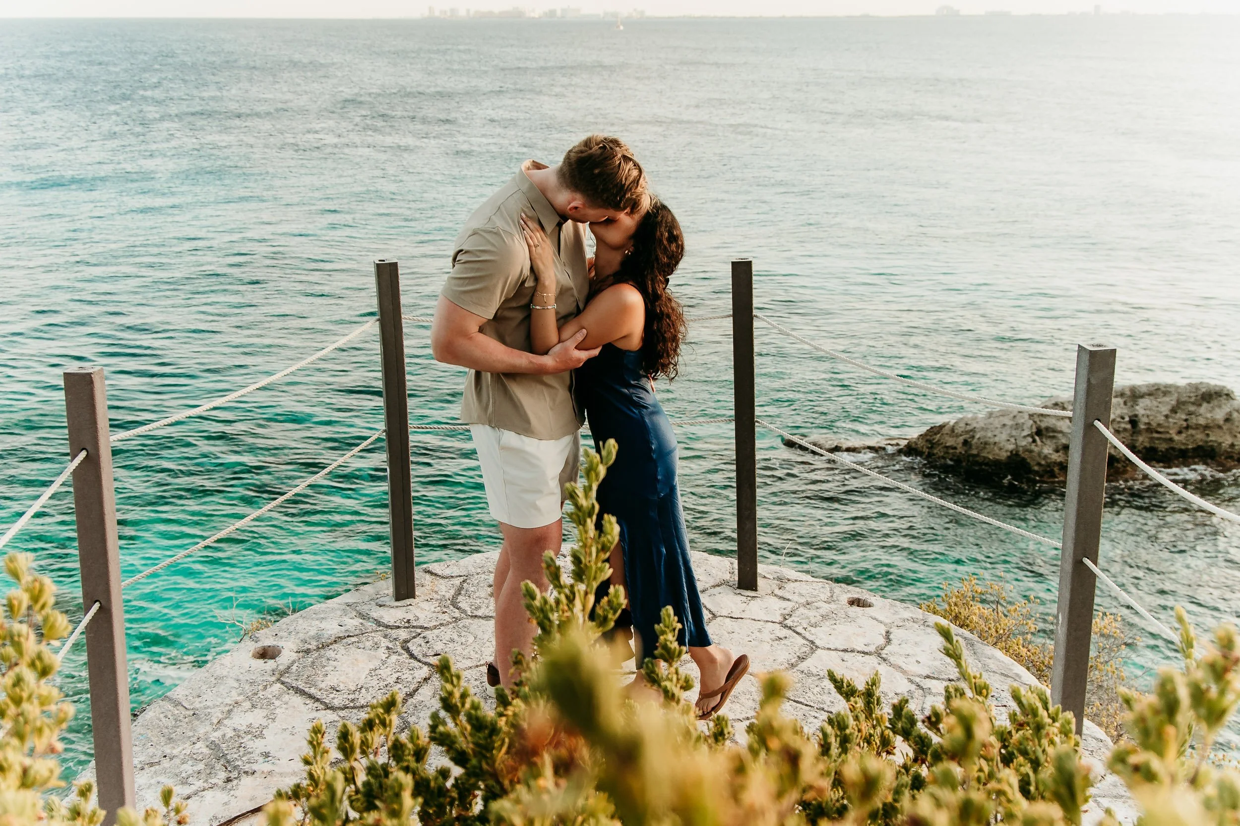 punta-sur-isla-mujeres-photographer-couple-embrace.jpg