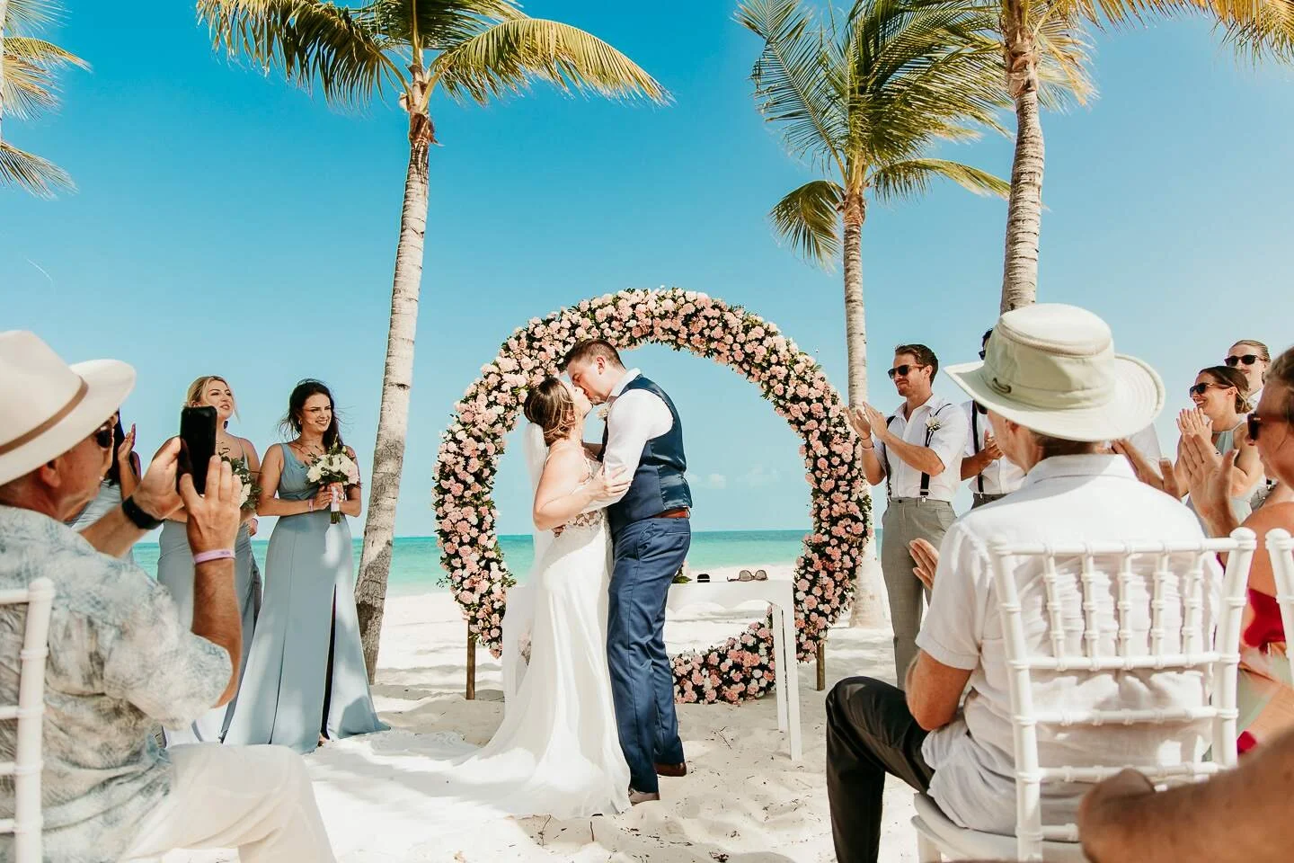 First kiss at Riu Palace Costa Mujeres wedding.