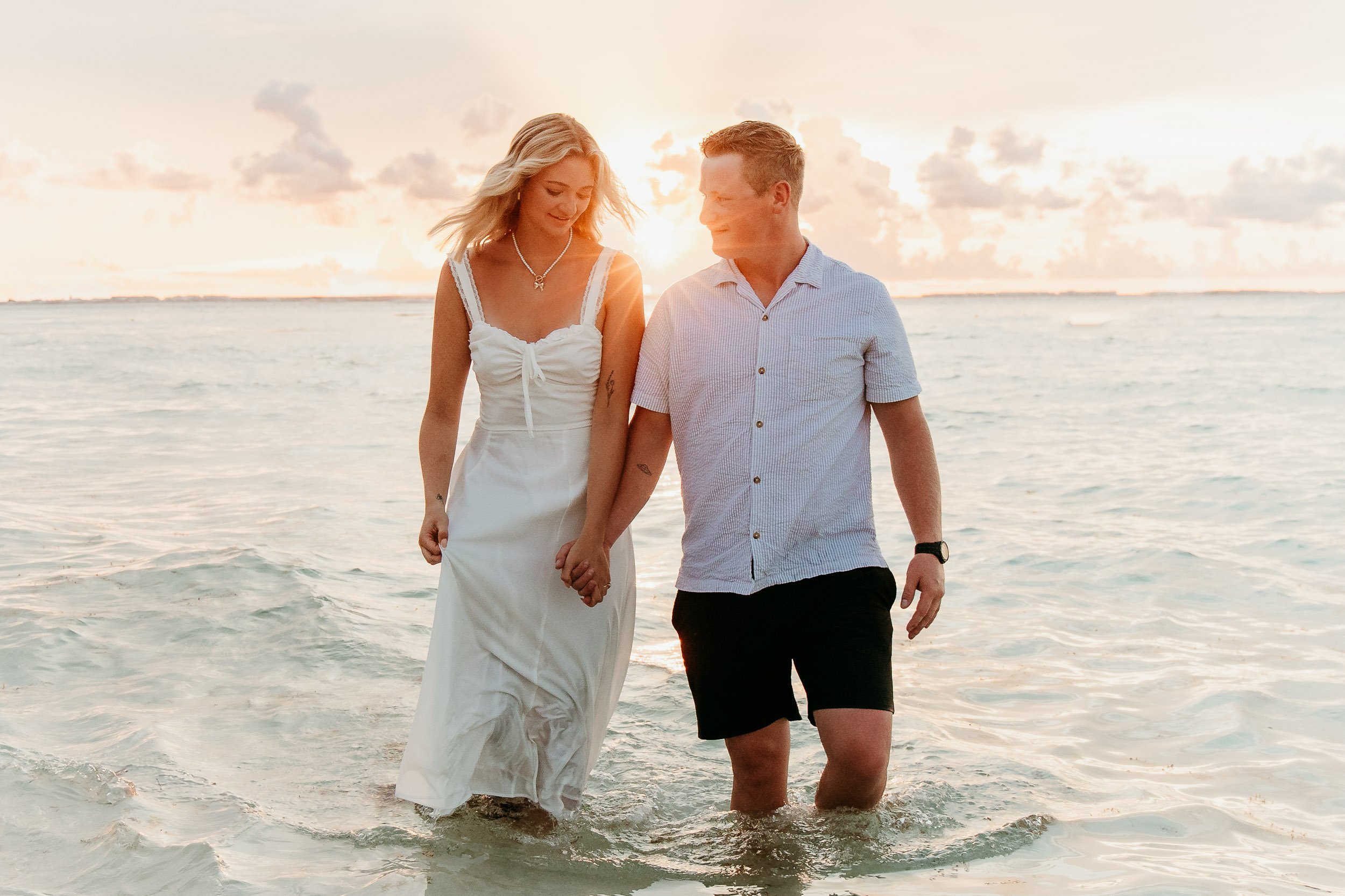isla-mujeres-photographer-couple-in-ocean.jpg