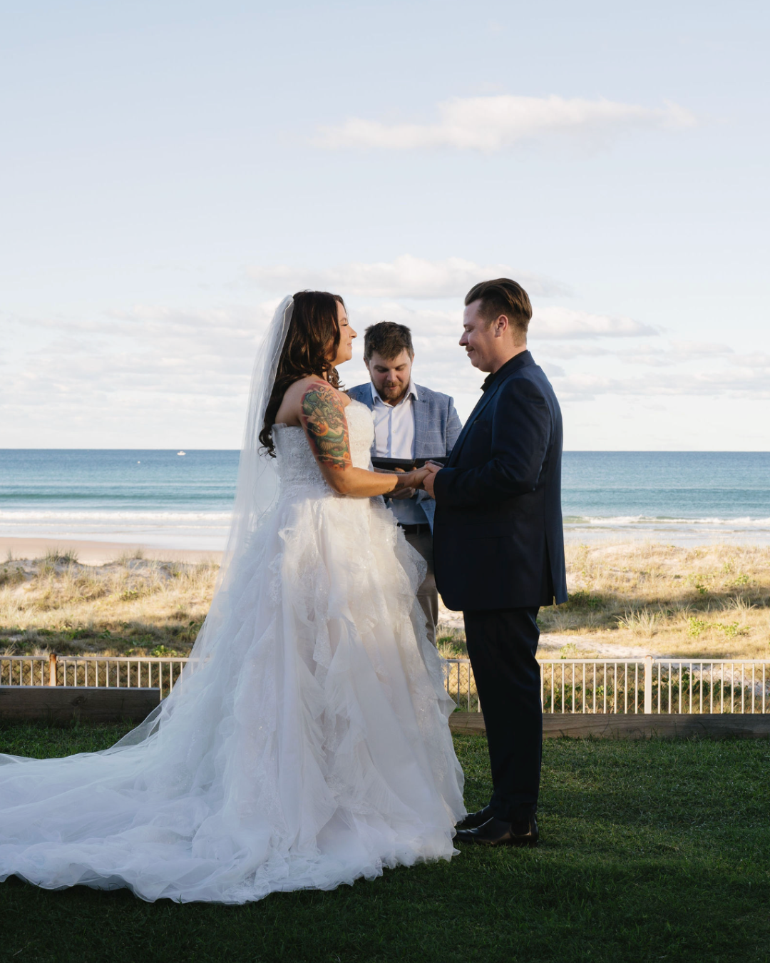 Male wedding MC speaking at microphone during Gold Coast wedding reception